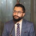 आफ्नै पार्टीका नेता–कार्यकर्ताको विरोधमा परे शिक्षामन्त्री पोखरेल, कार्यक्रमस्थलबाट बाहिरिए